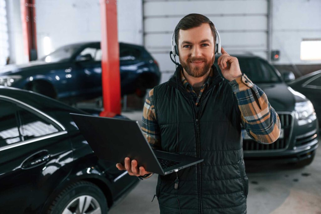 garage and workshop ideas, technician talking with customer over headset