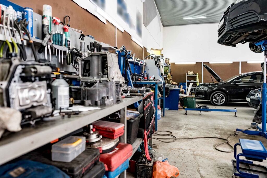 setting up a garage workshop, garage workshop area filled with tools and equipment