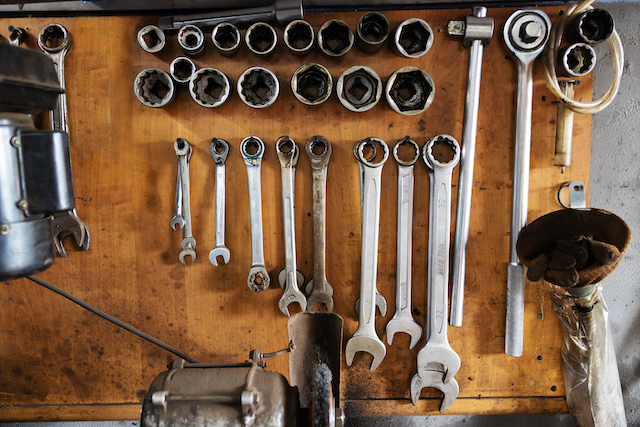 New garage tools, a collection of car repair tools on a table.